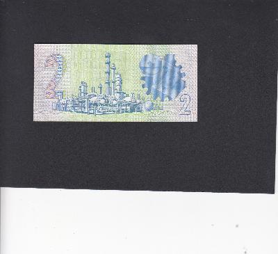 Beschrijving achterzijde: RAFINERY